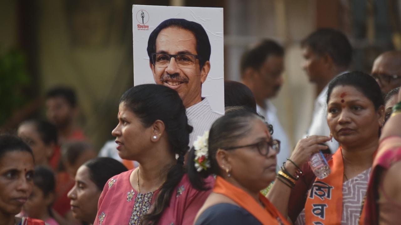 People were also seen holding posters of party chief Uddhav Thackeray, Shiv Sena founder Bal Thackeray and Congress leaders