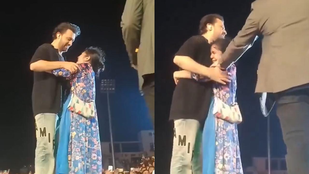 Atif Aslam gracefully handles an emotional fan who jumped on stage mid-concert and refused to let go of him - watch video