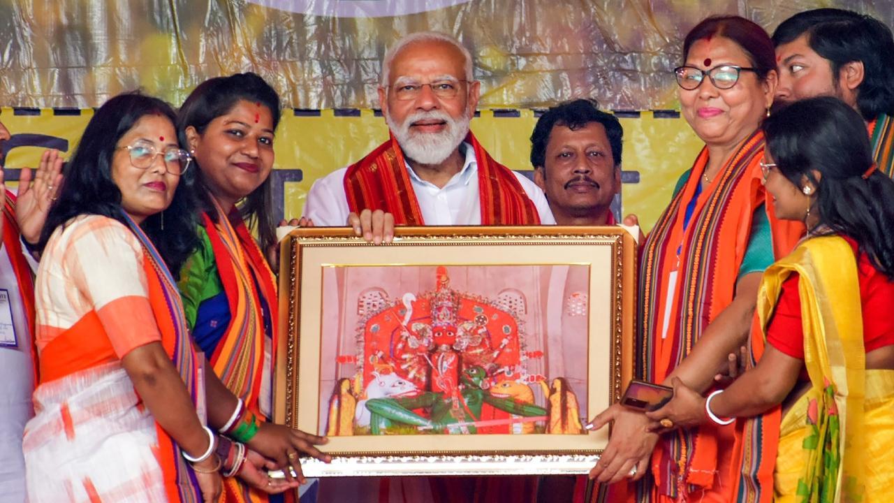 IN PHOTOS: 'For West Bengal's devp, it is imp for BJP to win,' says PM Modi