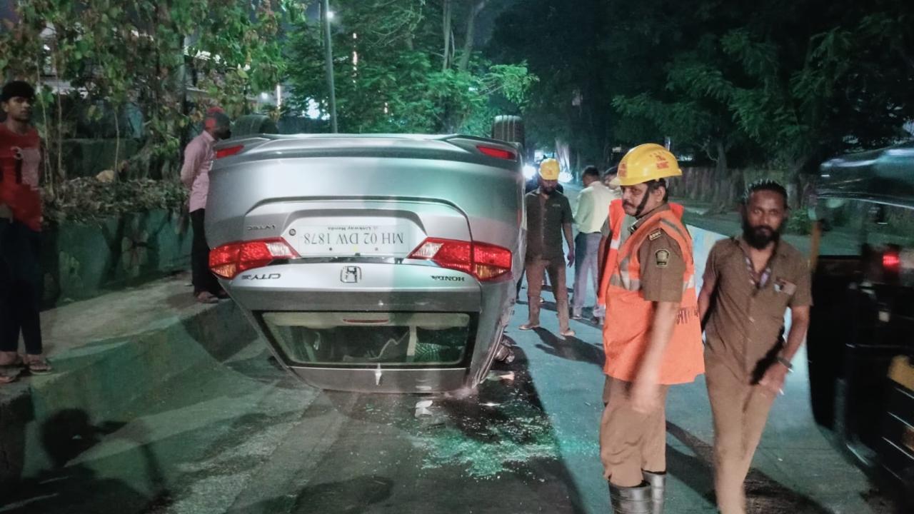 The car driver lost control over the wheels, following which the vehicle hit the road divider and overturned, Thane Municipal Corporation's disaster management cell chief Yasin Tadvi said