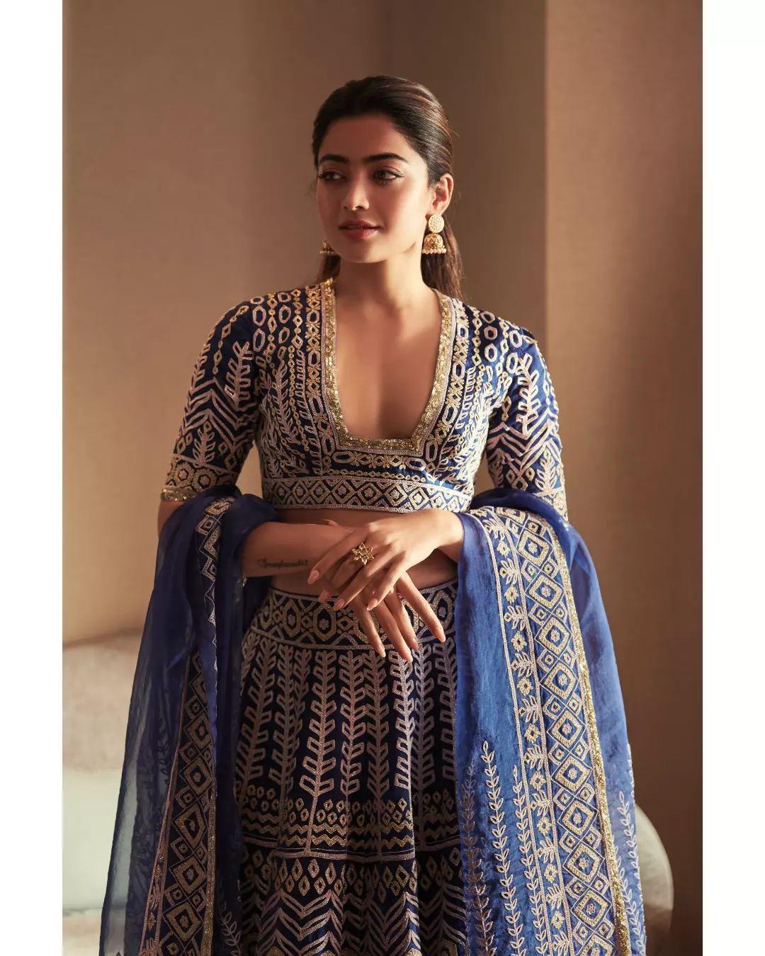 Get into the spirit of Chaitra Navratri by opting for a stunning dark blue lehenga decorated with intricate dori work featuring both floral and geometric designs.