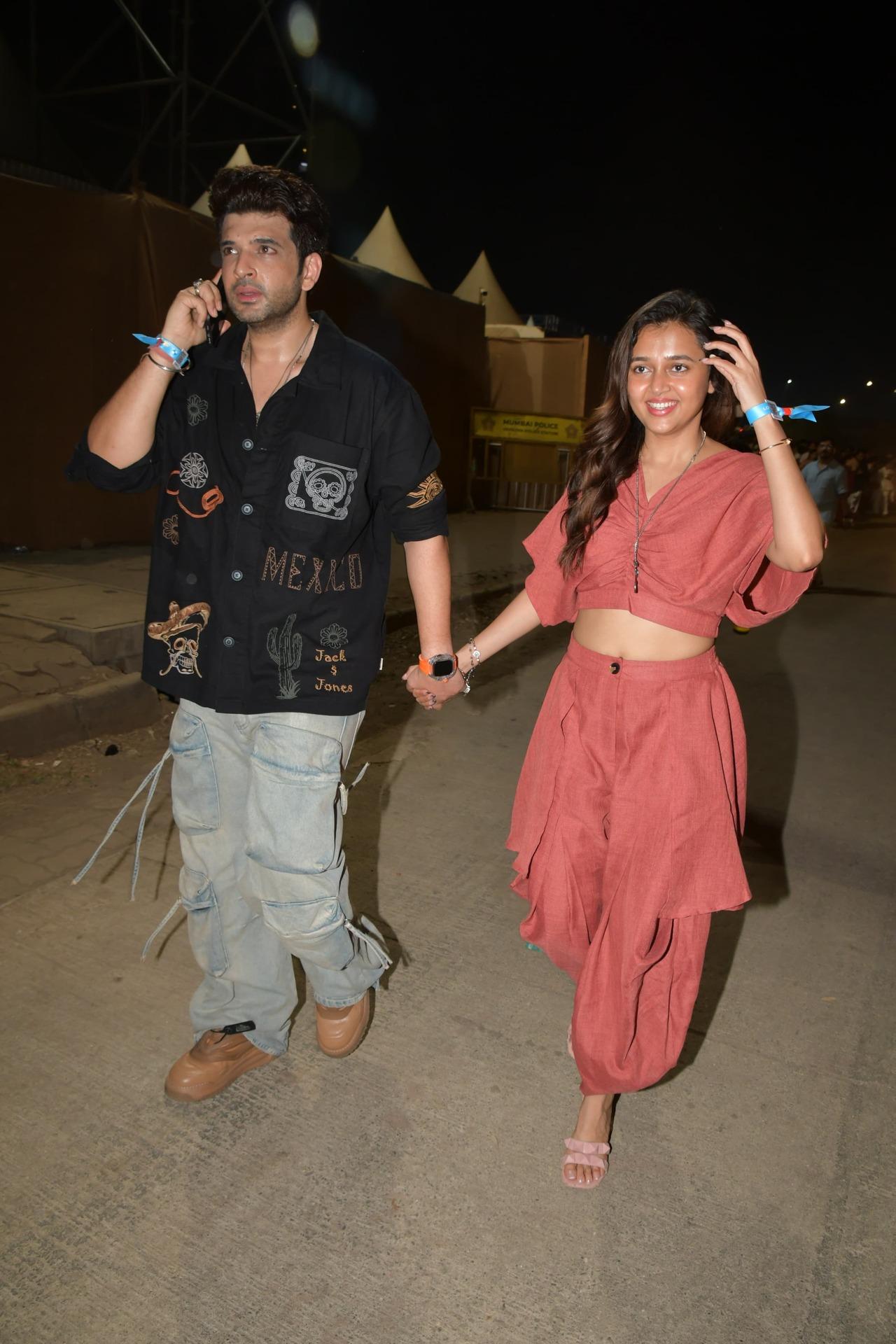 Internet's favourite couple Karan Kundrra and Tejasswi Prakash attended the concert and were all smiles for the paparazzi. 