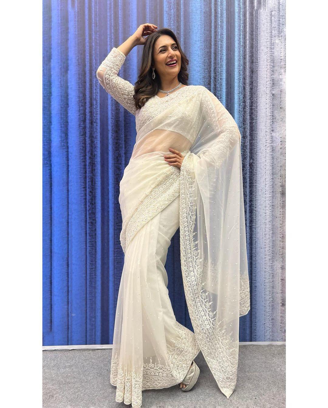 One can never go wrong with a saree, and Divyanka Tripathi proved it right as she wore a stunning sheer white saree and paired it with a matching blouse