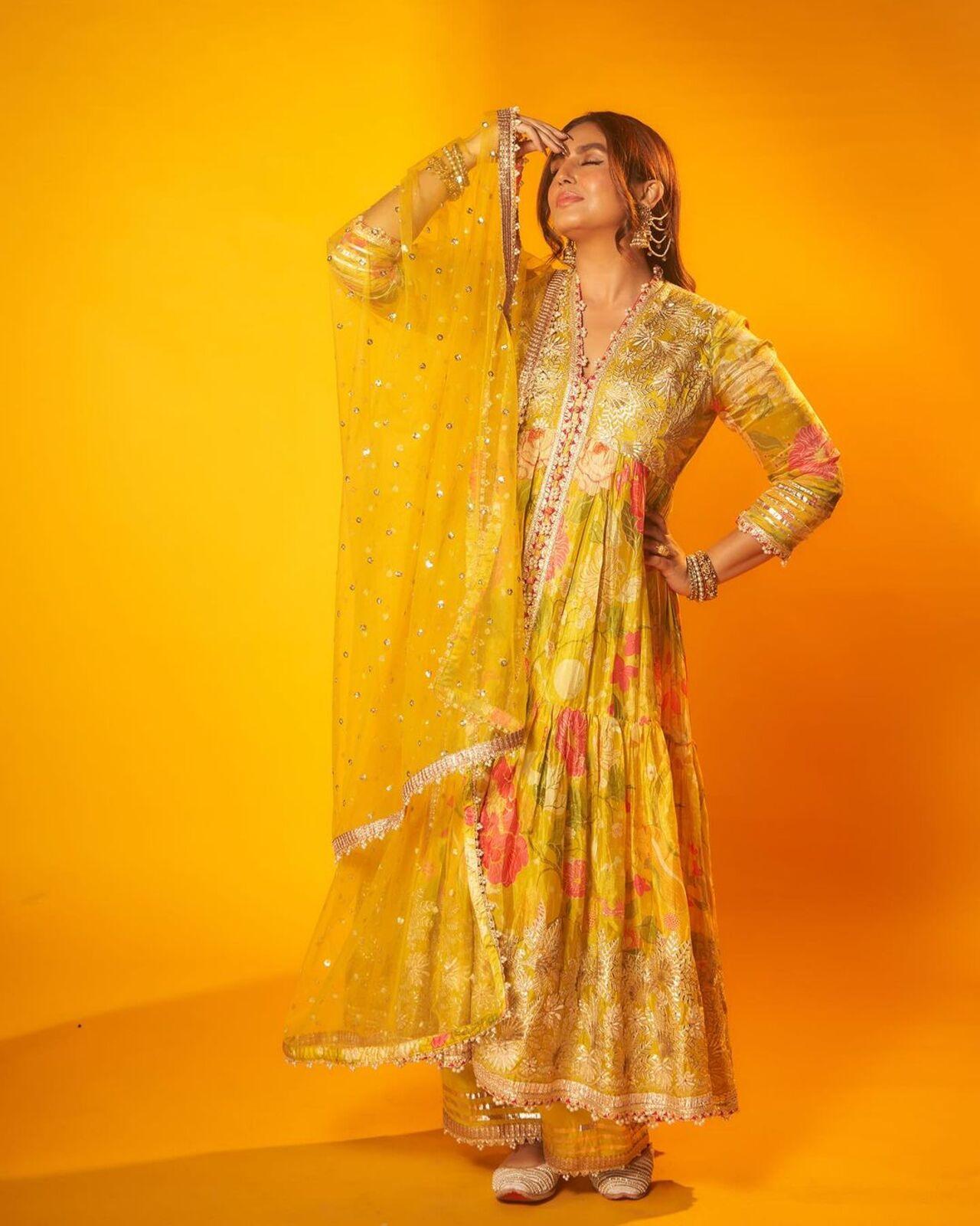 Huma Qureshi shared a string of pictures of herself dressed in a yellow suit wishing all on Eid