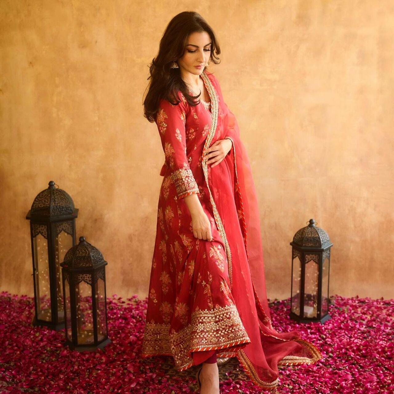 Soha Ali Khan shared pictures of herself dressed ina  red suit while wishing her followers on Eid
