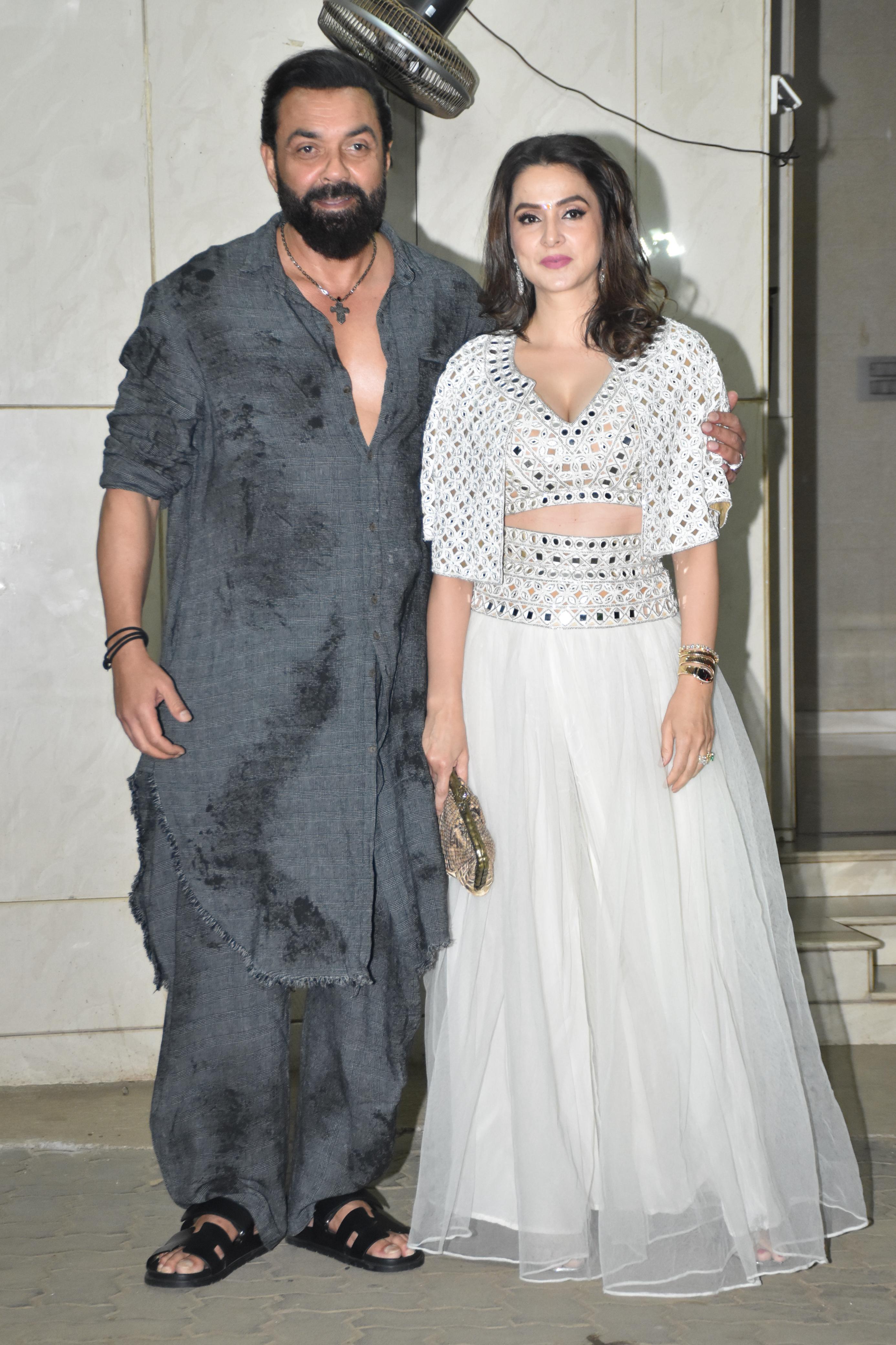 Khan family's close friend Bobby Deol was also snapped at Sohail's residence. The actor aced his look in grey pathani while his wife complemented her in white lehenga