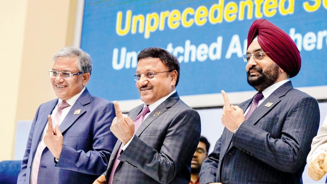 CEC Rajiv Kumar with ECs Gyanesh Kumar and S S  Sandhu at a press conference. Pic/PTI 