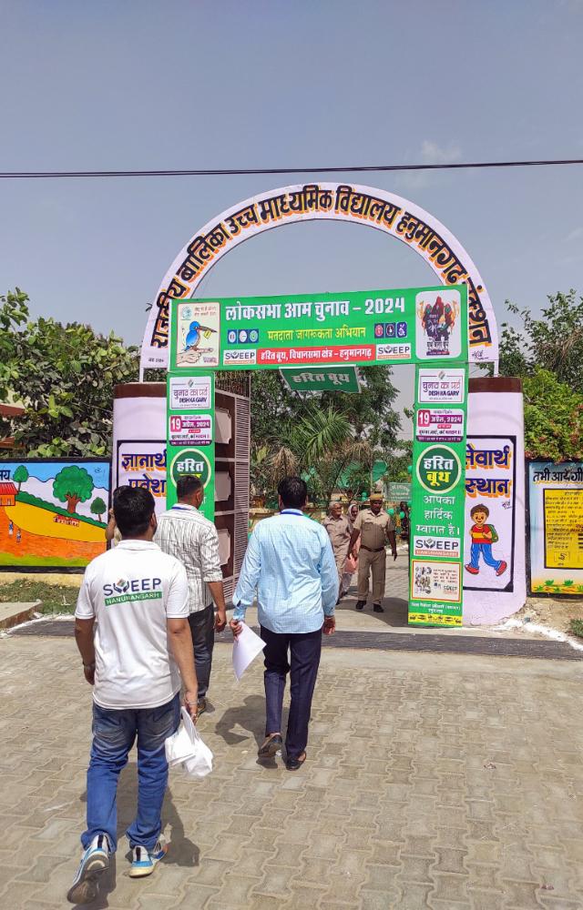 Voters arrive to cast their votes for the first phase of the Lok Sabha elections, at a polling booth, in Hanumangarh on Friday. (ANI Photo)