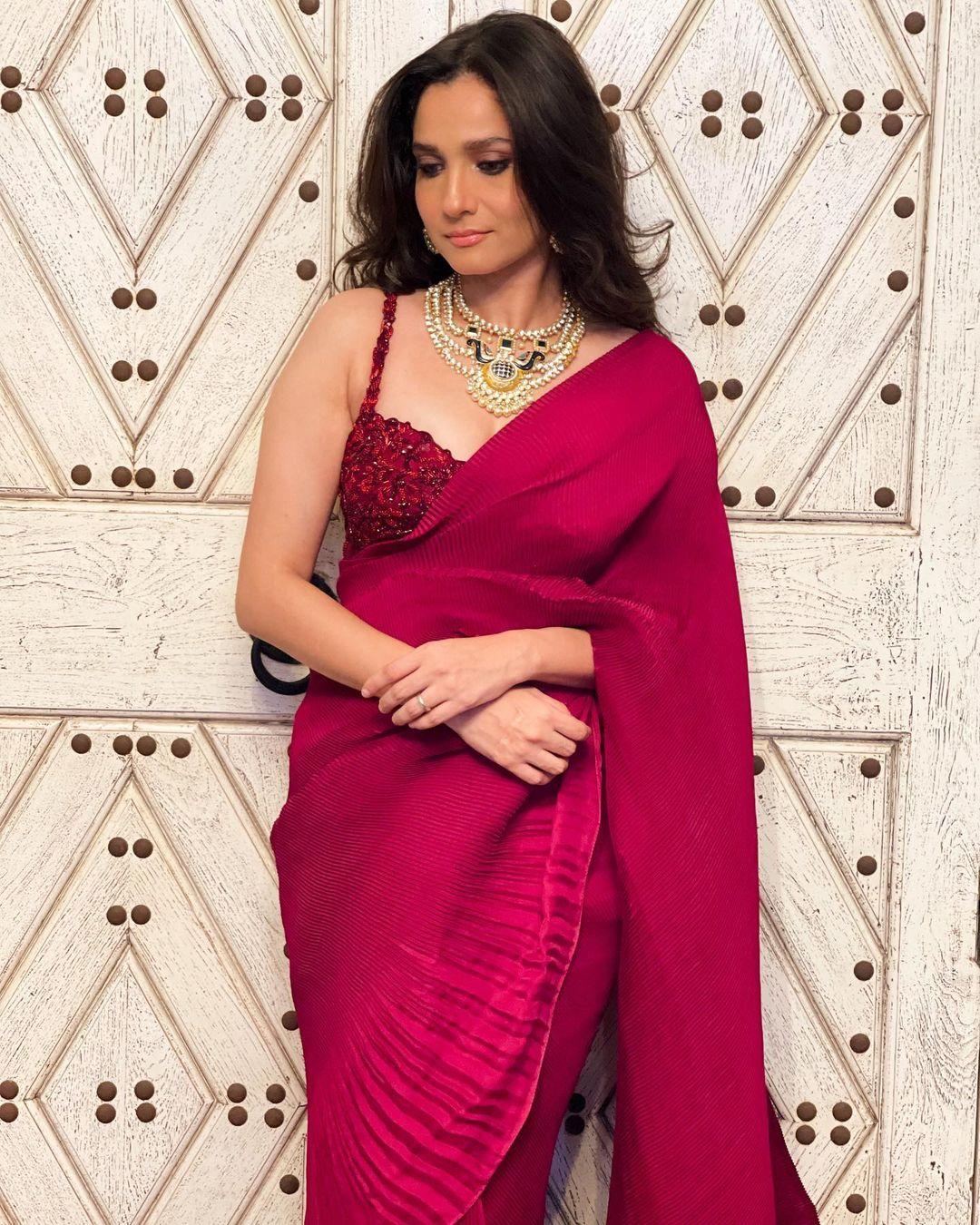 Ankita Lokhande has a knack for ethnic looks, and in this look, we can't take our eyes off her. The actress paired a stunning pink saree with a sequin strappy blouse, which added a touch of modernity