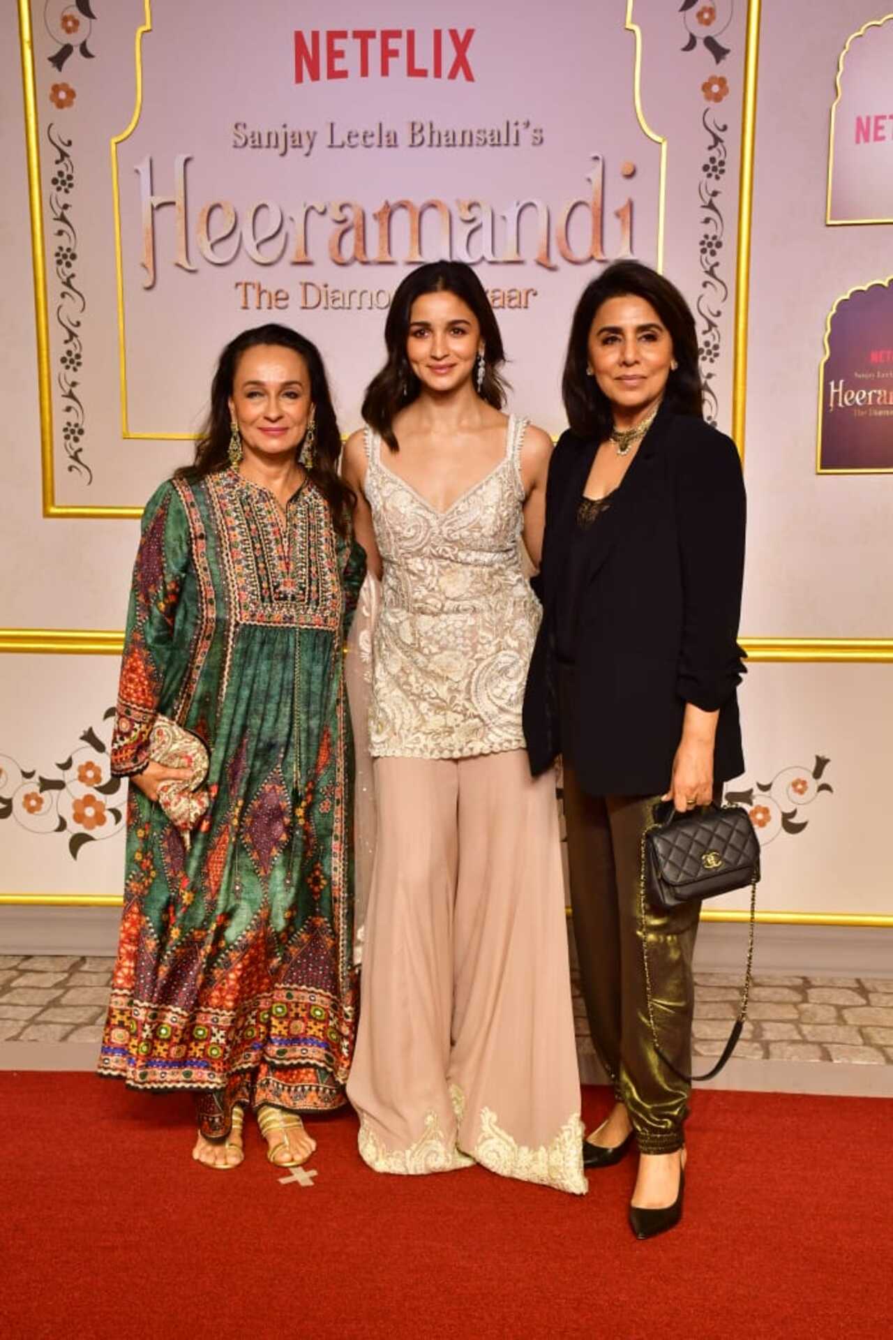 Alia Bhatt poses with her mother Soni Razdan and mother-in-law Neetu Kapoor on the red carpet