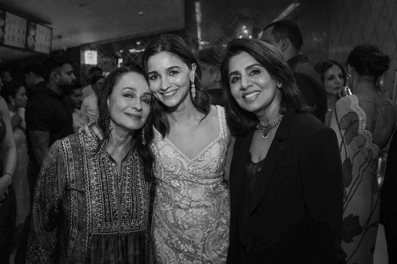 Another picture shows Alia having an adorable moment with her mother Soni Razdan and mother-in-law Neetu Kapoor. 