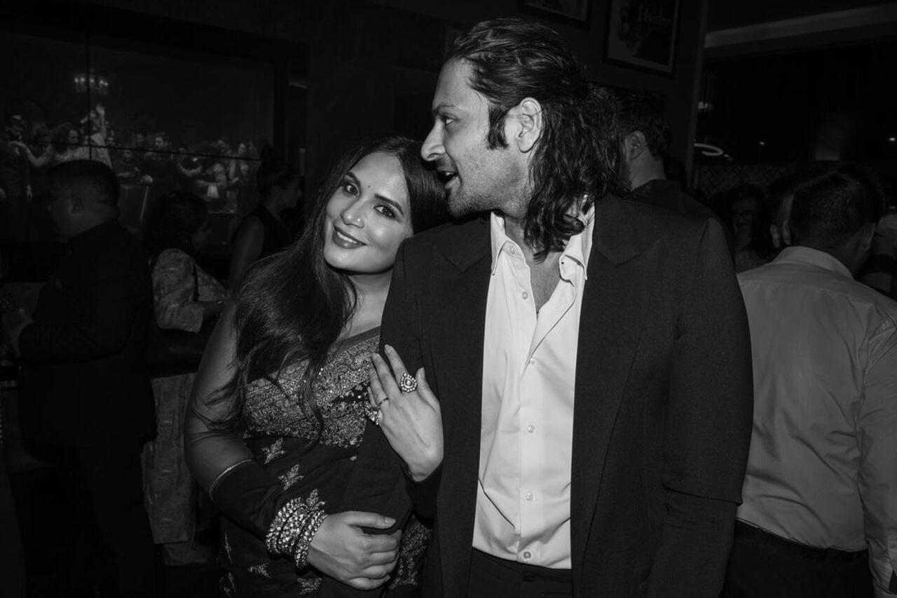 Parents-to-be Richa Chadha and Ali Fazal shared a mushy moment as the actress held onto her husband while posing for a picture. 