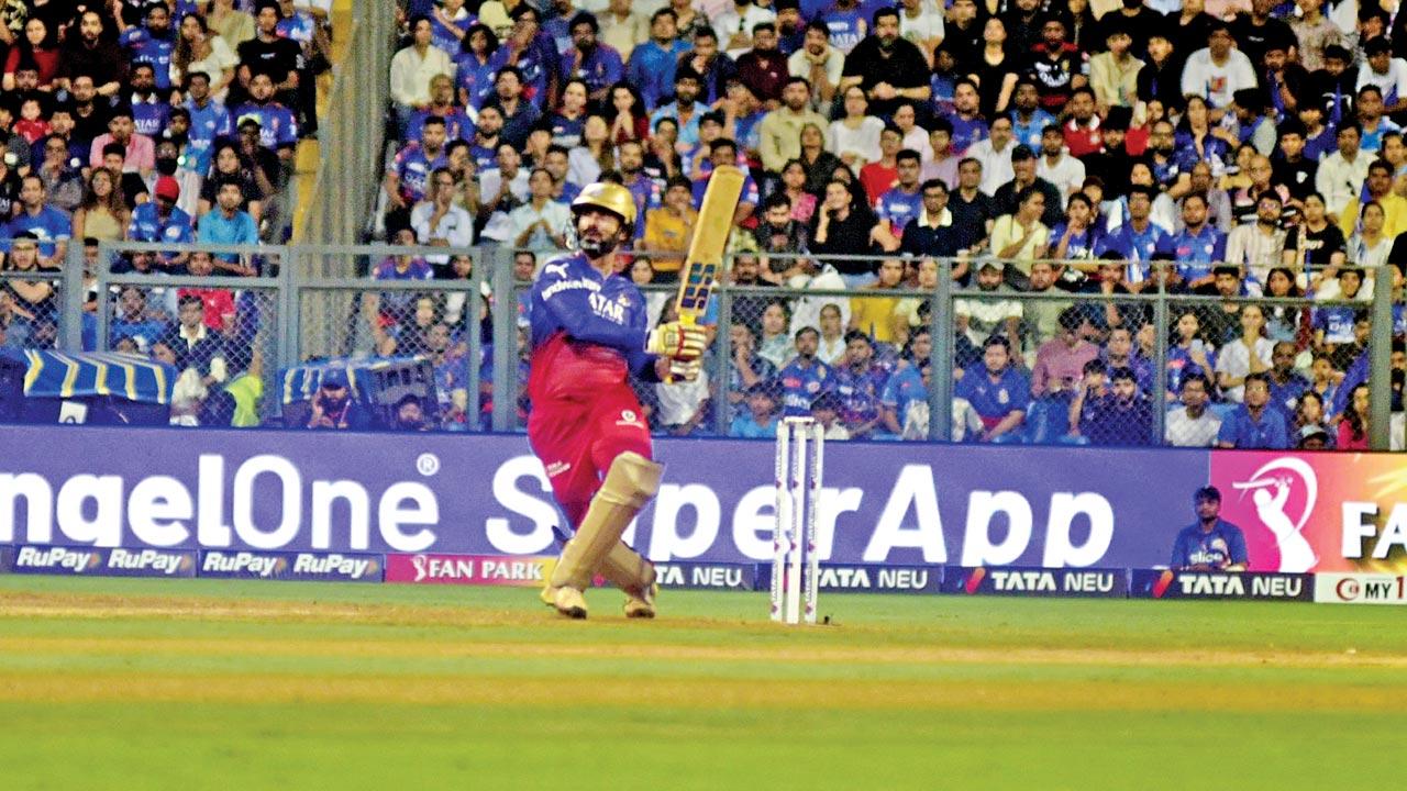 RCB’s Dinesh Karthik during his half-century against MI yesterday