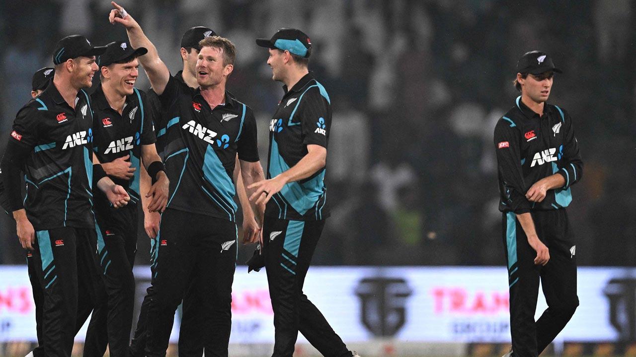 New Zealand`s cricketers celebrate at the end of the fourth Twenty20 international cricket match between Pakistan and New Zealand at the Gaddafi Cricket Stadium in Lahore. Pic/AFP