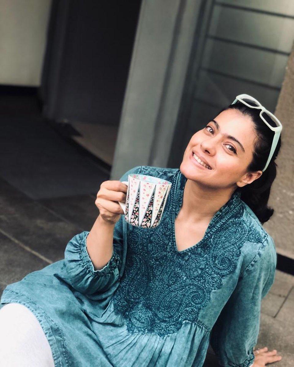 This area, likely connected to their backyard because of the sunlight and open layout, has floors that resemble granite and white walls, making it bright and welcoming—a spot where Kajol likes to relax with a cup of tea.