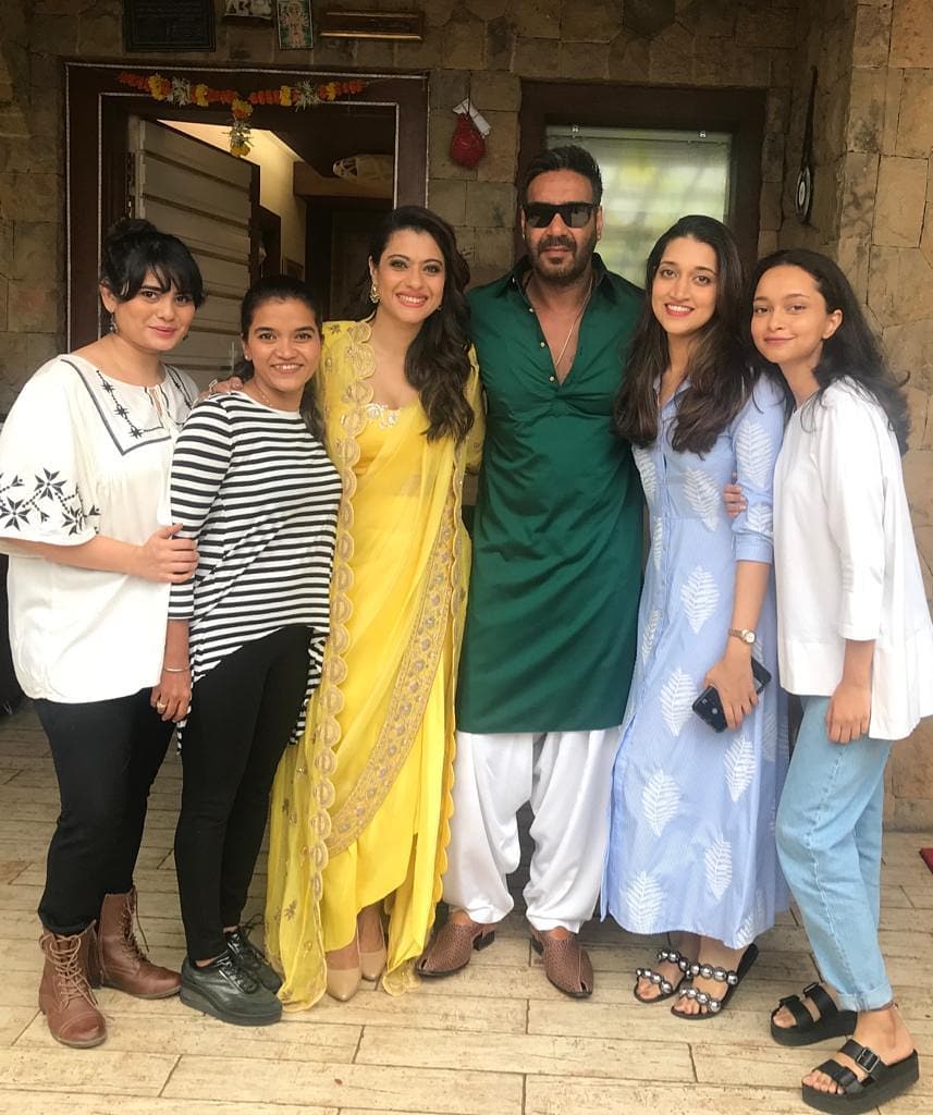 At Ajay Devgn and Kajol's house, you're greeted by a huge entrance that looks like something out of a palace. The stone walls give it a natural and old-fashioned feel, making you feel right at home.