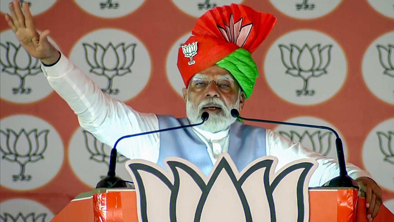 Prime Minister Narendra Modi addresses a public meeting for the third phase of the Lok Sabha elections, in Satara on Monday. (ANI Photo)