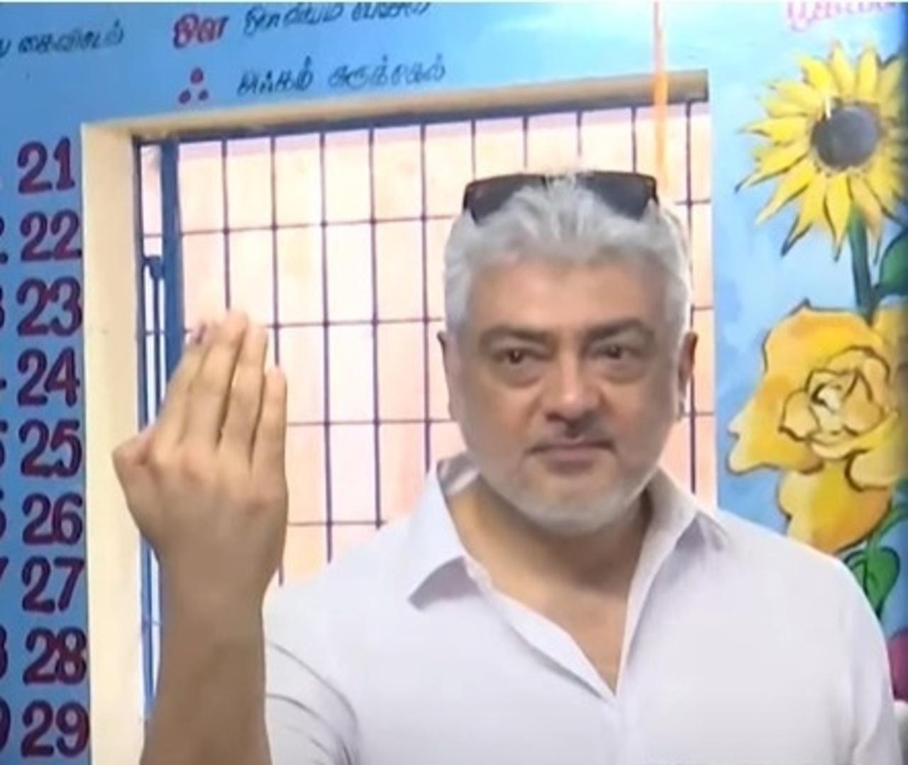 Ajith shows his inked finger with pride