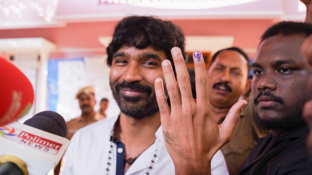 The actor flaunted his inked finger after he cast his vote. He greeted the media outside the polling booth