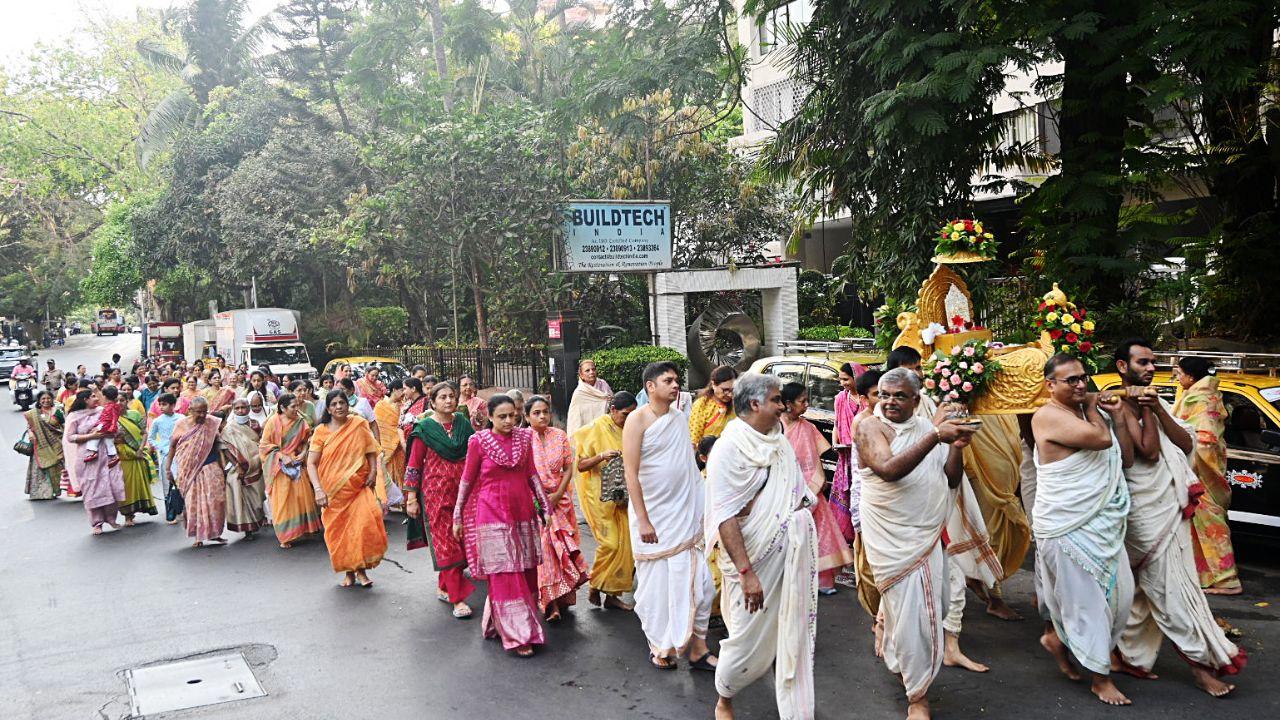 Devotees take part in the Shobha Yatra (religious procession) from Shripal Nagar Jain Temple on the occasion of the Mahavir Jayanti, in Mumbai on Sunday. (ANI Photo)