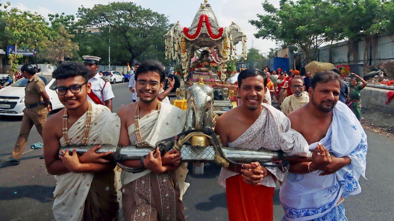 Priests and devotees take part in a Shobha Yatra (religious procession) to commemorate the birth anniversary of Lord Mahavira on the occasion of Mahavir Jayanti, in Chennai on Sunday. (ANI Photo)