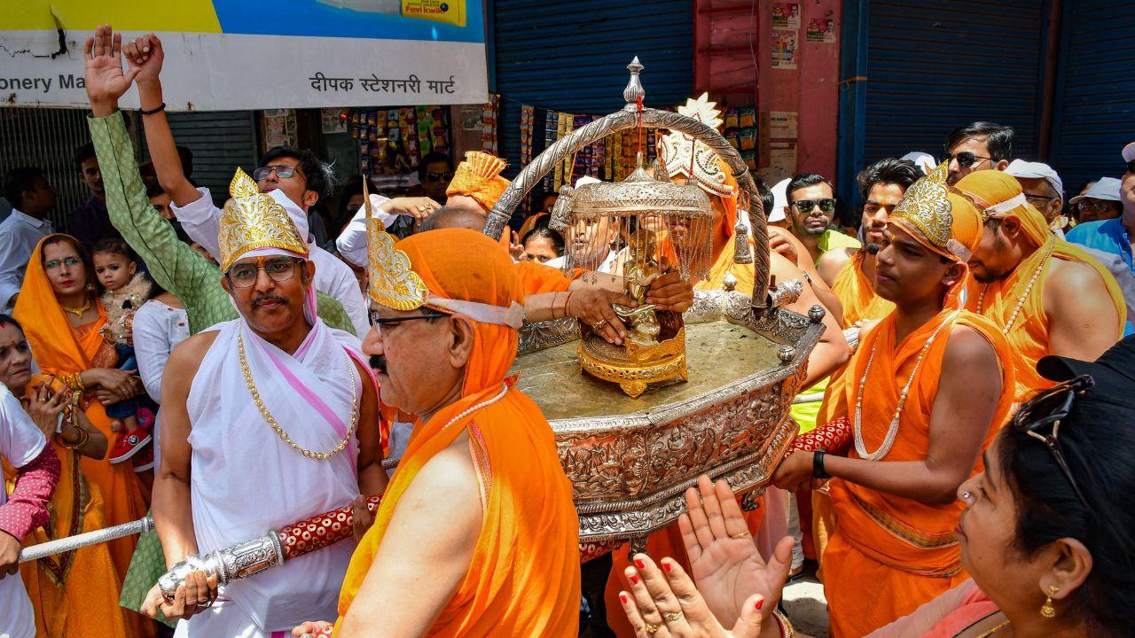 Jain community members take part in a religious procession on the occasion of Mahavir Jayanti, in Prayagraj, Sunday, April 21, 2024. (PTI Photo)  