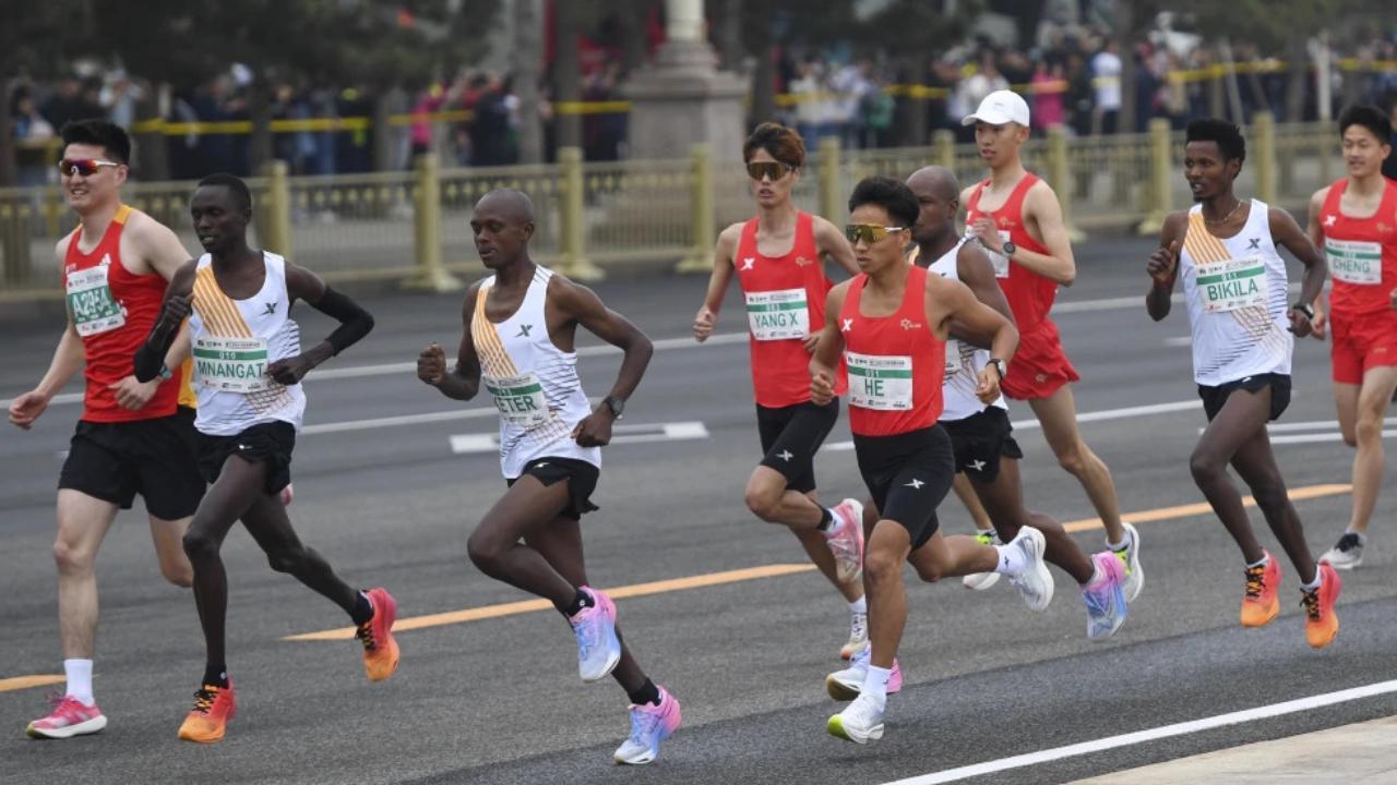 Medals stripped after probe reveals three athletes let Chinese runner win