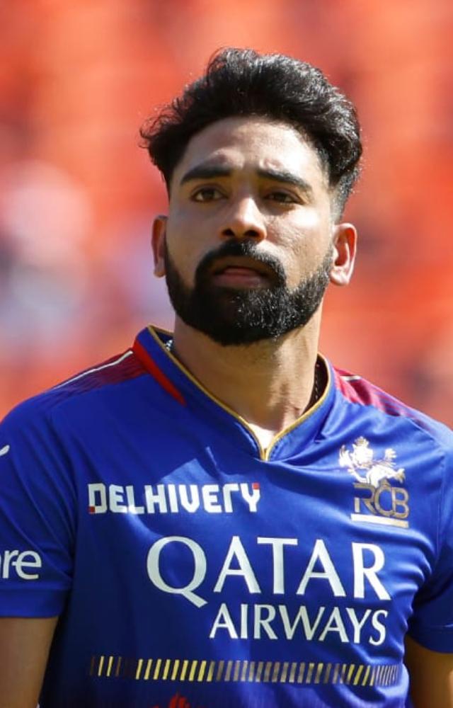 Pacer Mohammed Siraj registered the wicket of GT batsman Shahrukh Khan. Sirah bowled four overs by conceding 34 runs and bagged one wicket
