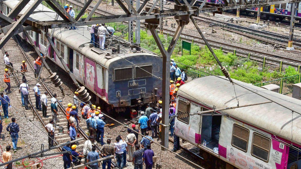 Restoration work underway after a local train derailed on the Harbour line, in Mumbai, Monday, April 29, 2024. (PTI Photo)