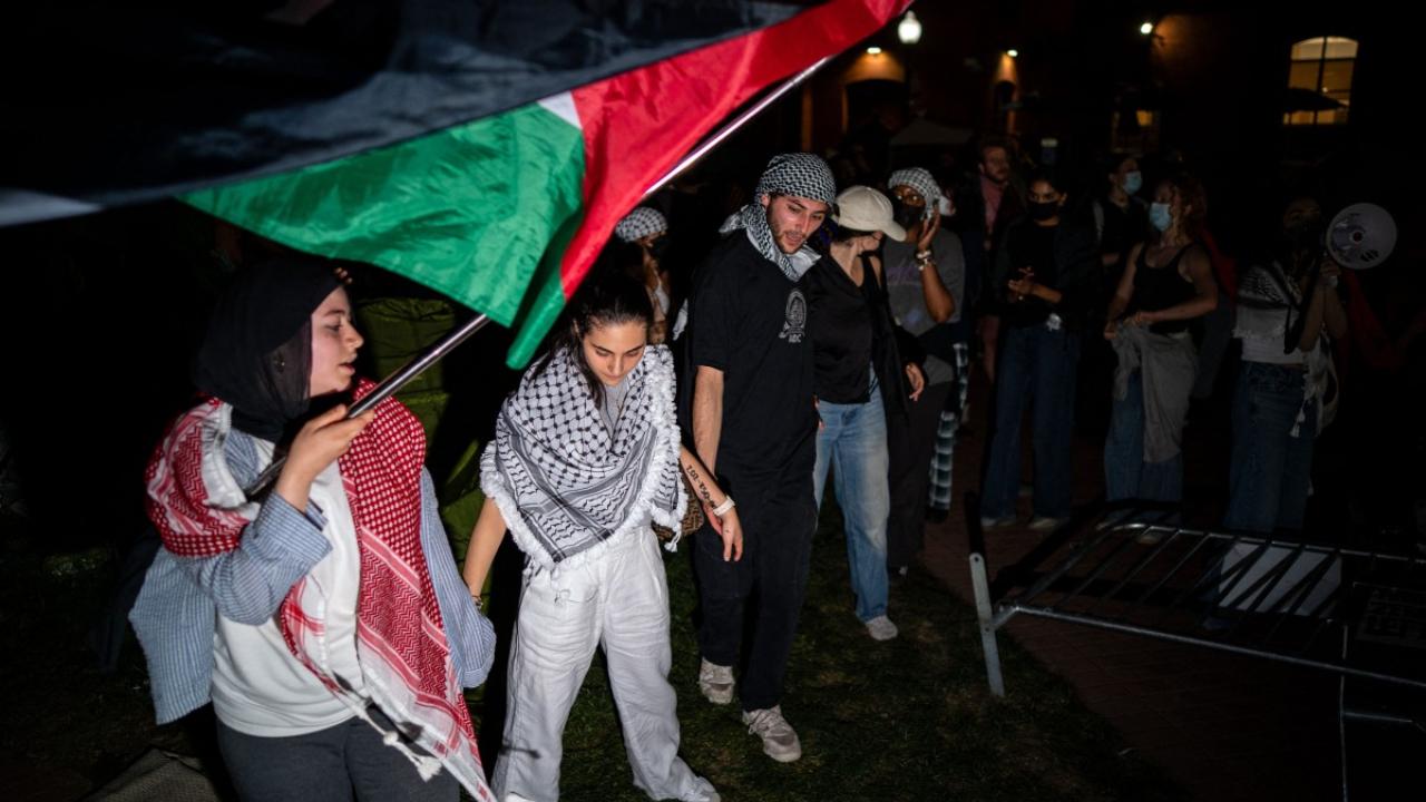 Dozens of students set up tents on Thursday in University Yard — which is bordered by GW's law school and other GW buildings — to call on the university to divest itself from financial ties with Israel, according to student newspaper The GW Hatchet. (Photo by Kent Nishimura/GETTY IMAGES NORTH AMERICA/Getty Images via AFP)