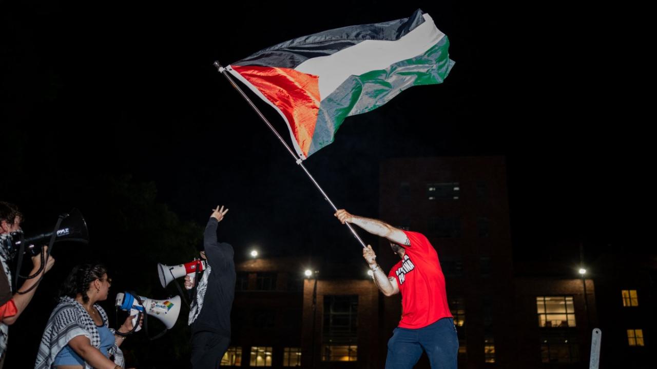 Protesters removed barriers around a pro-Palestinian encampment at the George Washington University in D.C. early Monday as officials try to push out demonstrators accused of disturbing life on campus, the university said in a mass email. (Photo by Kent Nishimura/GETTY IMAGES NORTH AMERICA/Getty Images via AFP)