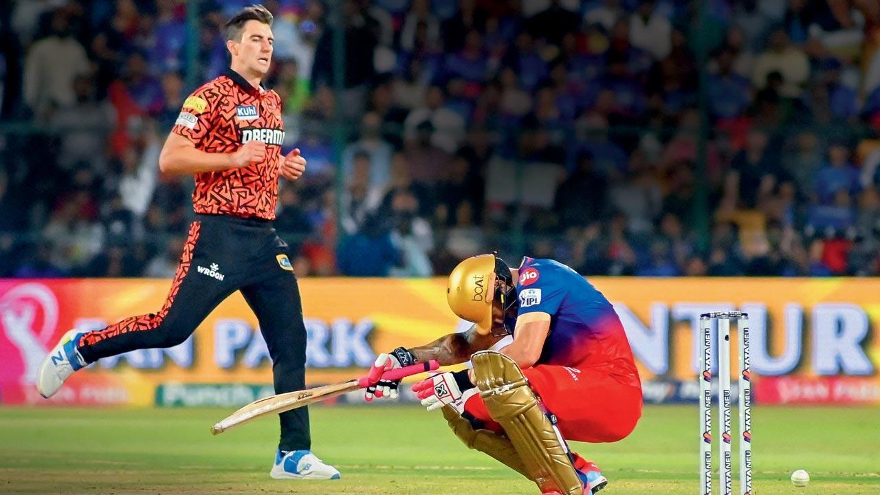 RCB skipper Faf du Plessis after being hit by a Pat Cummins delivery in the match against SRH in Bangalore on Monday. Pic/PTI
