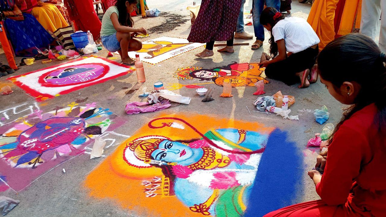 Children participate in a rangoli making competition ahead of Ram Navami festival, at Jagdalpur in Bastar district, Sunday, April 14, 2024. (PTI Photo)