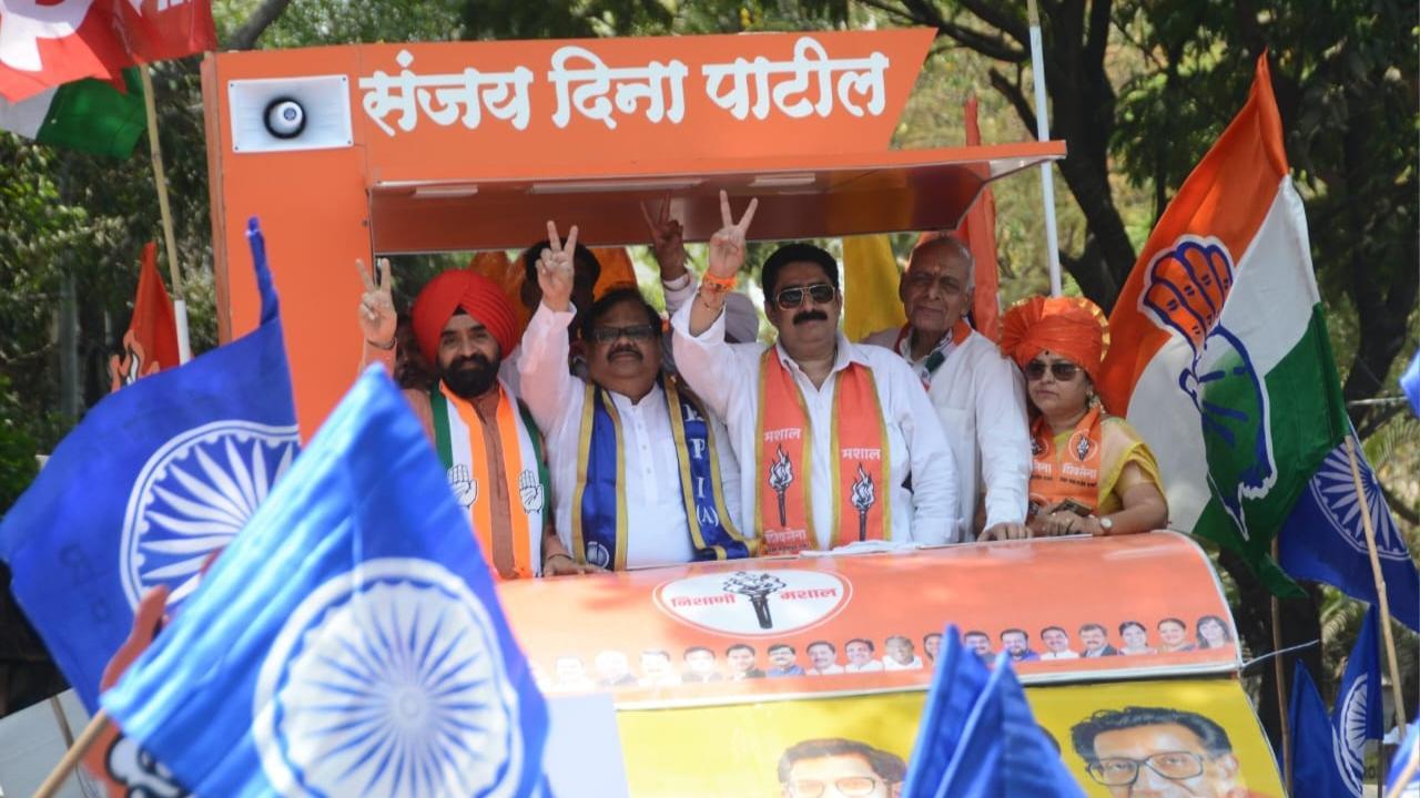 Sanjay Dina Patil along with other party leaders on the way to file his nomination for Lok Sabha polls. Pics/Sameer Abedi