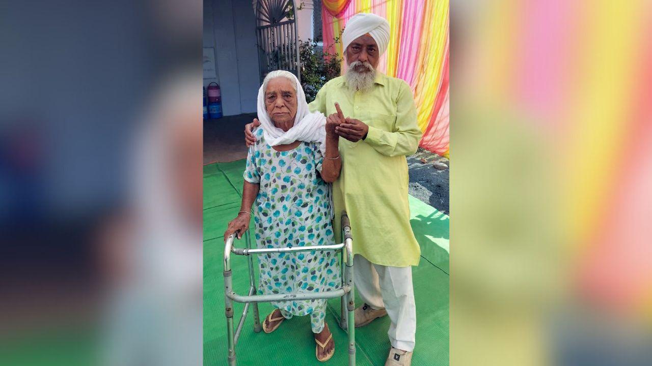A 92-year-old Jaswant Kaur and her son Surjeet Singh Mutreja cast their vote for the second phase of the Lok Sabha elections, in Kareli on Friday. (ANI Photo) 
