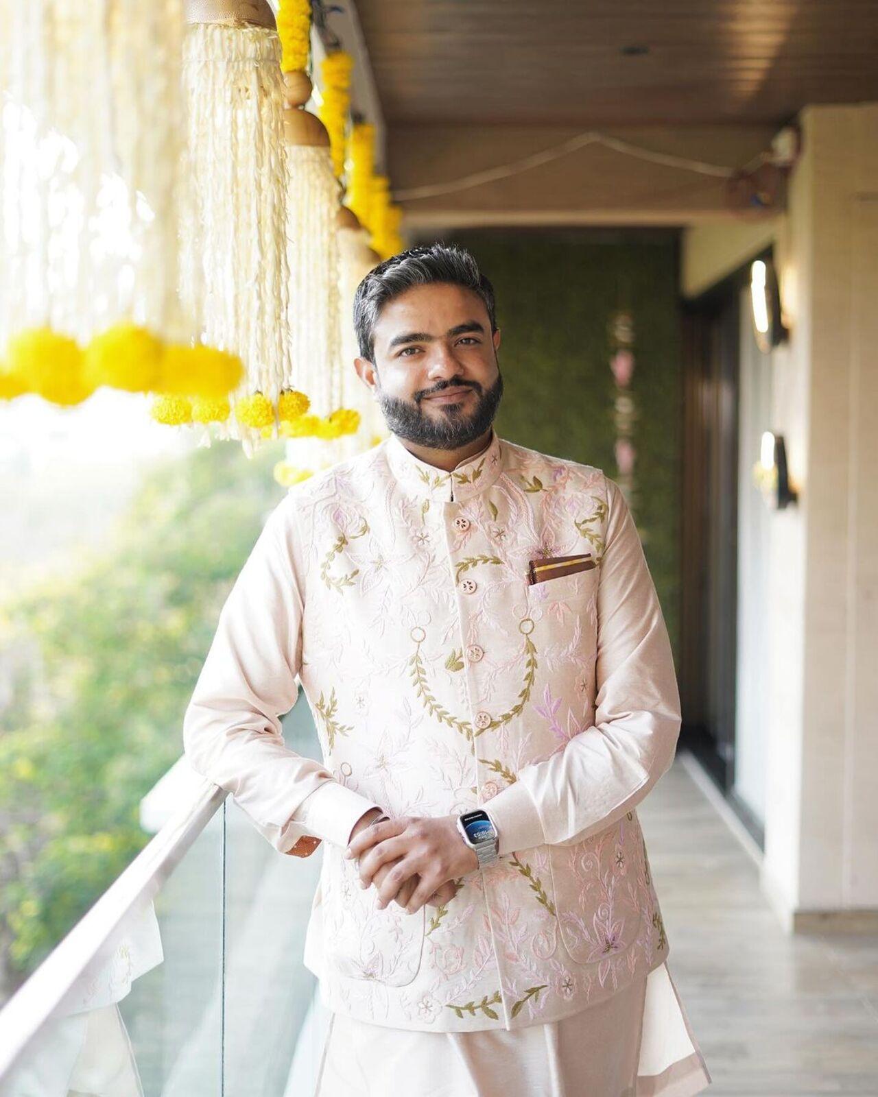 Siddharth Chopra opted for a stunning light peach coloured sherwani which featured green patterns on it