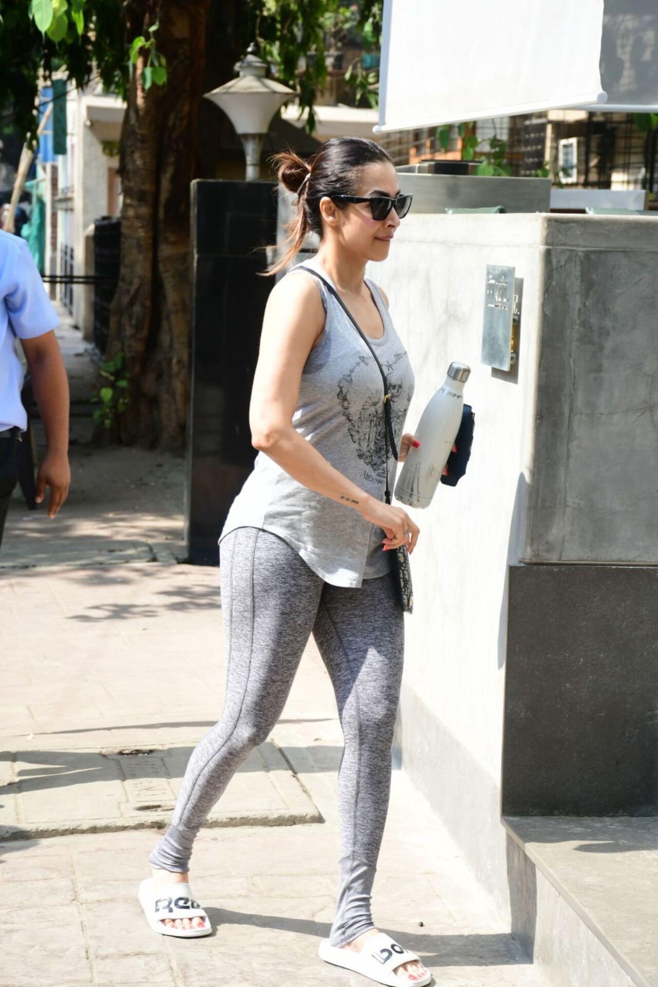 Malaika Arora was spotted entering her Yoga class. She looked stunning in athleisure. 
