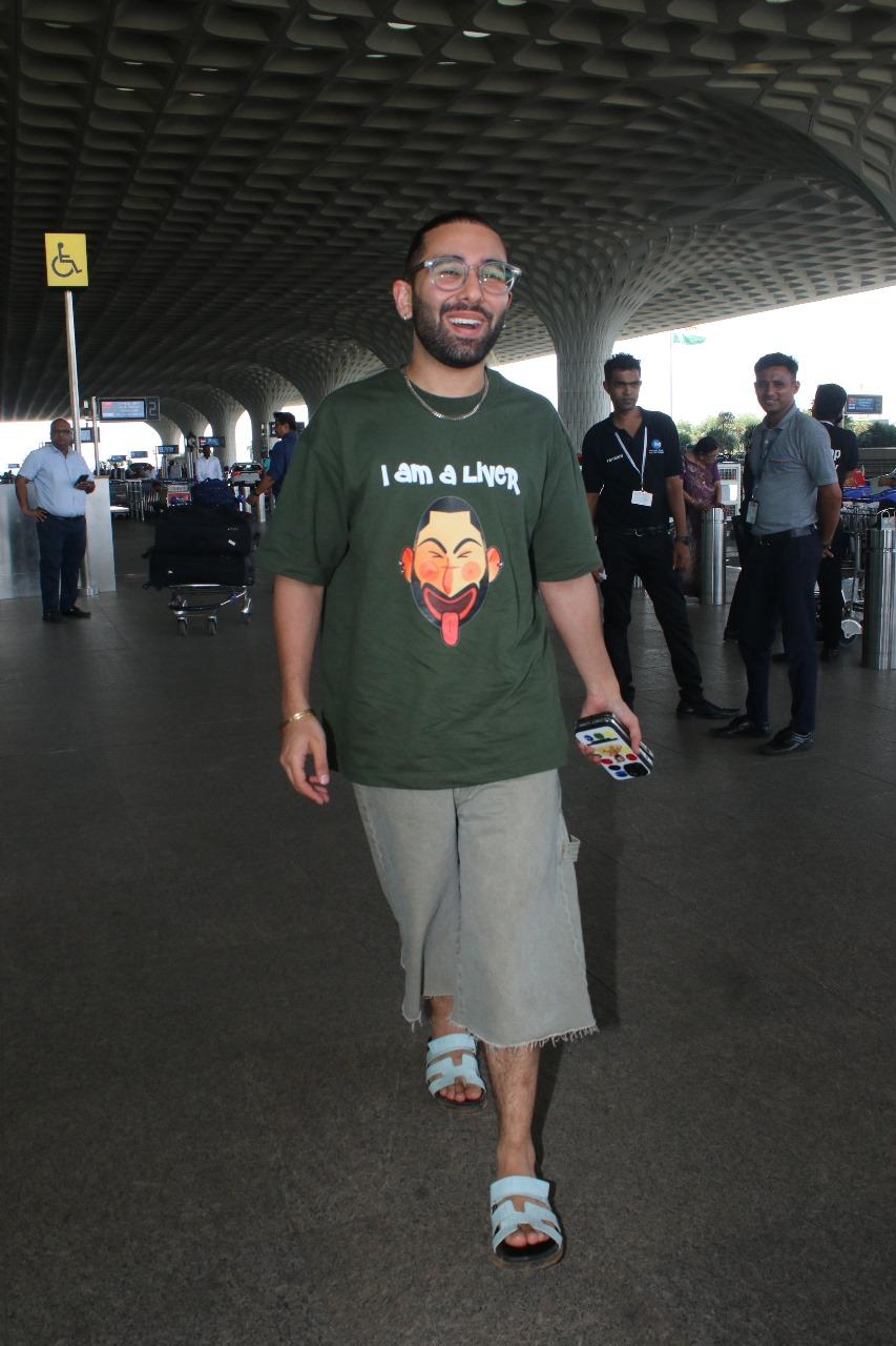 Orry was clicked at the Mumbai airport sporting some of his newly released merch