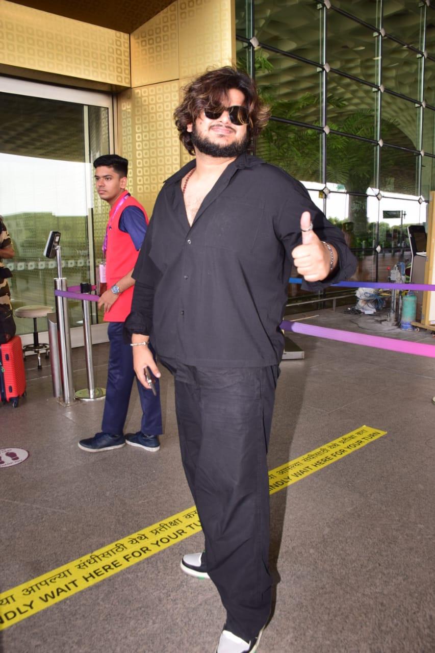 Vishak Mishra posed for the paparazzi at the Mumbai airport today