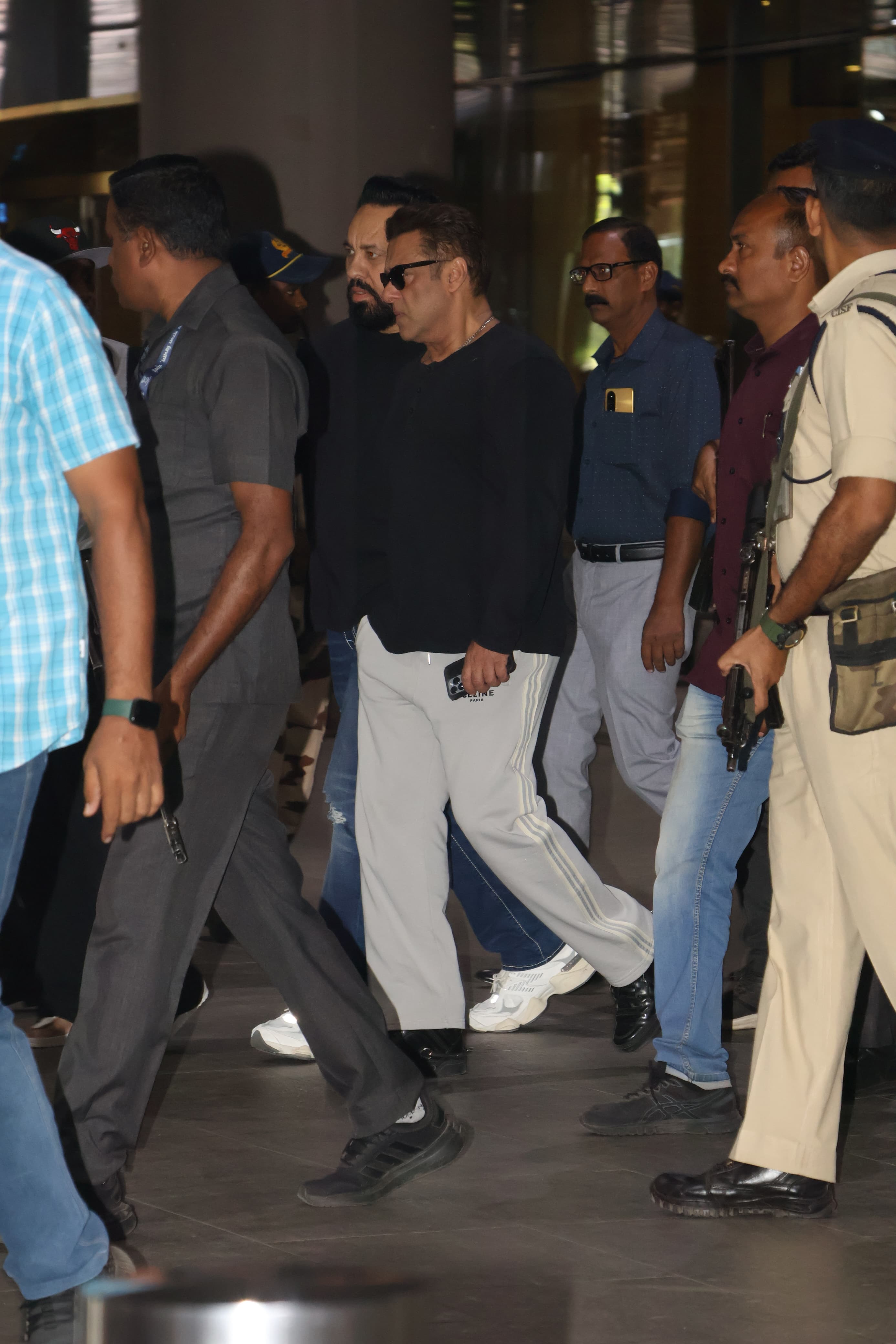 Afer an enjoyable time in Dubai, Salman Khan was seen arriving in Mumbai with tight security