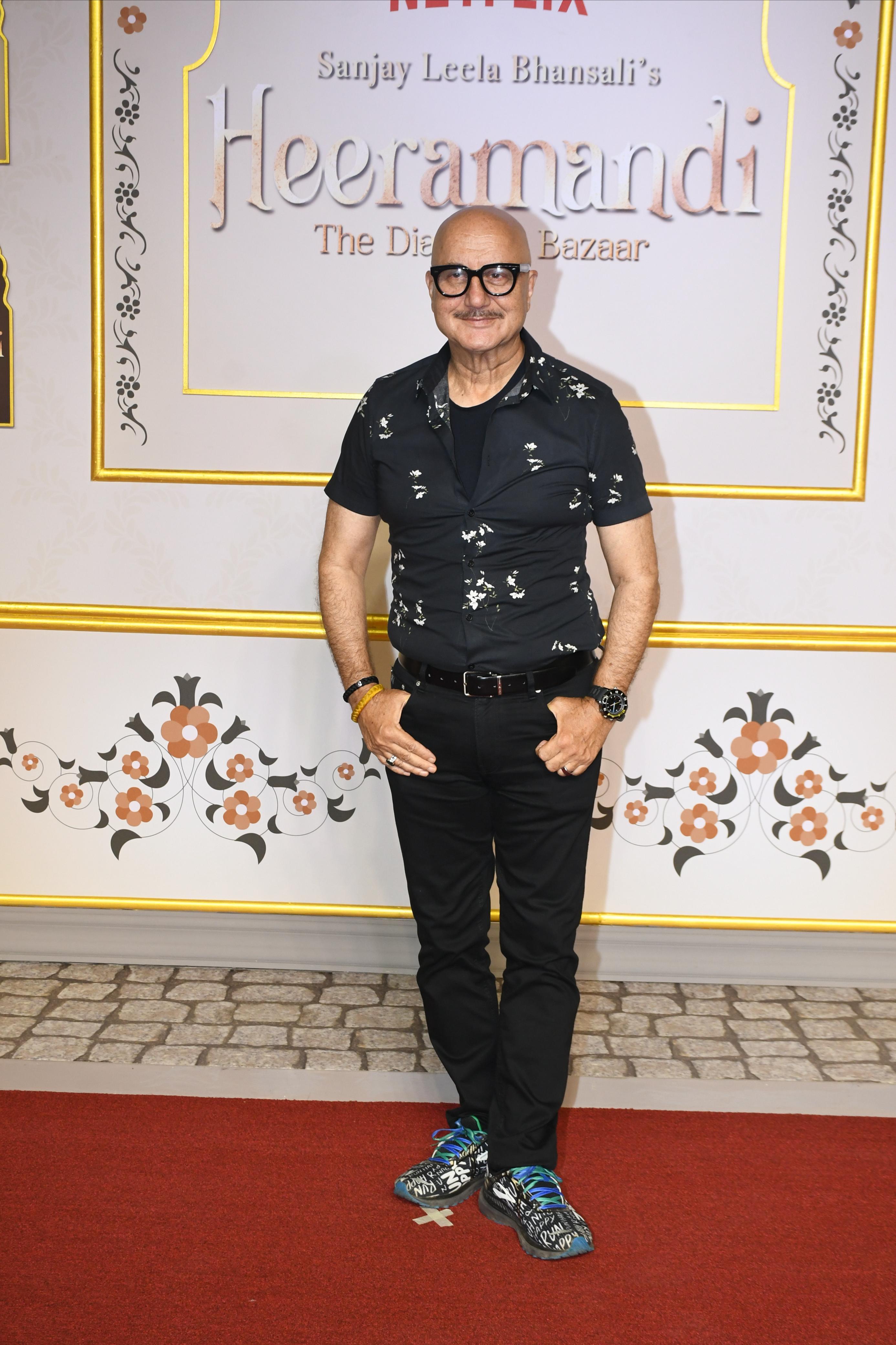 Anupam Kher flashed his smile for the paparazzi at the Heeramandi premiere