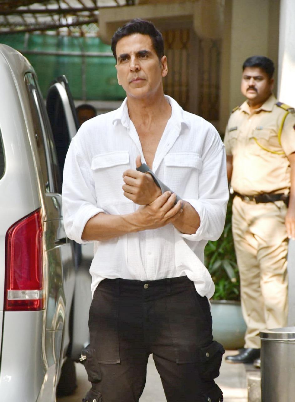 Akshay Kumar looked dapper in a white shirt and trousers