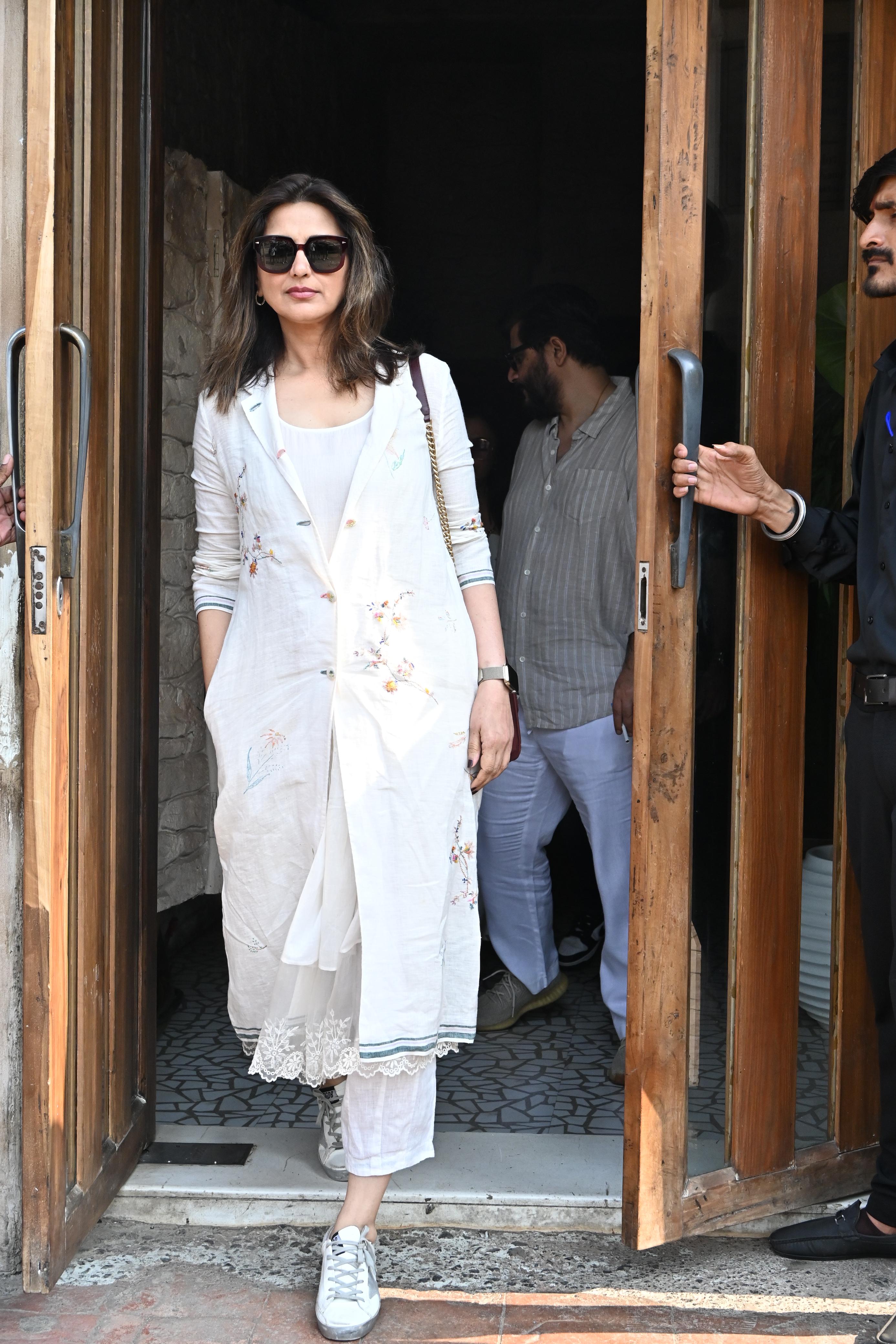 Sonali Bendre was clicked with her husband after a tasty meal at Bastian, Bandra