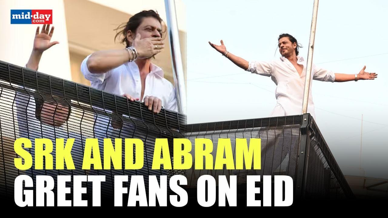 Shah Rukh Khan does his iconic pose as he greets fans outside Mannat on Eid!