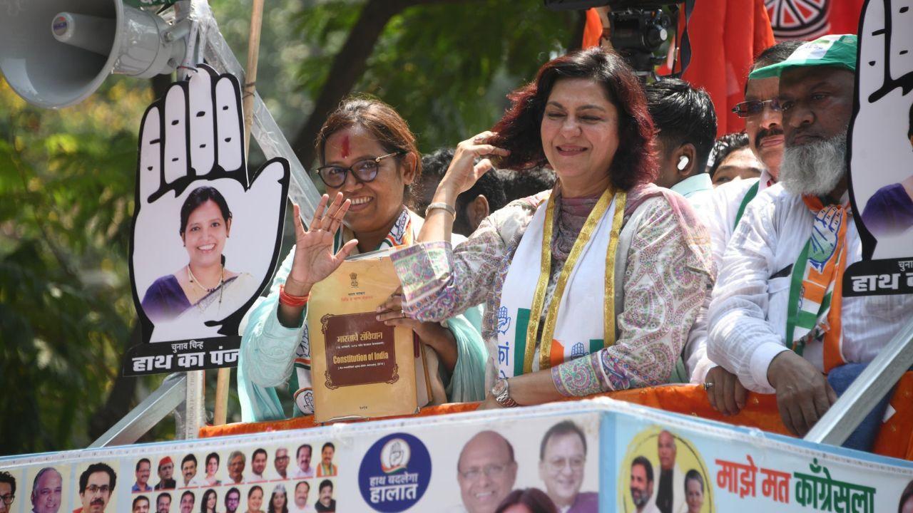 Varsha Gaikwad, the Congress city unit chief, on Tuesday, led a roadshow ahead of filing her nominations for Lok Sabha Elections 2024. Pics/ X