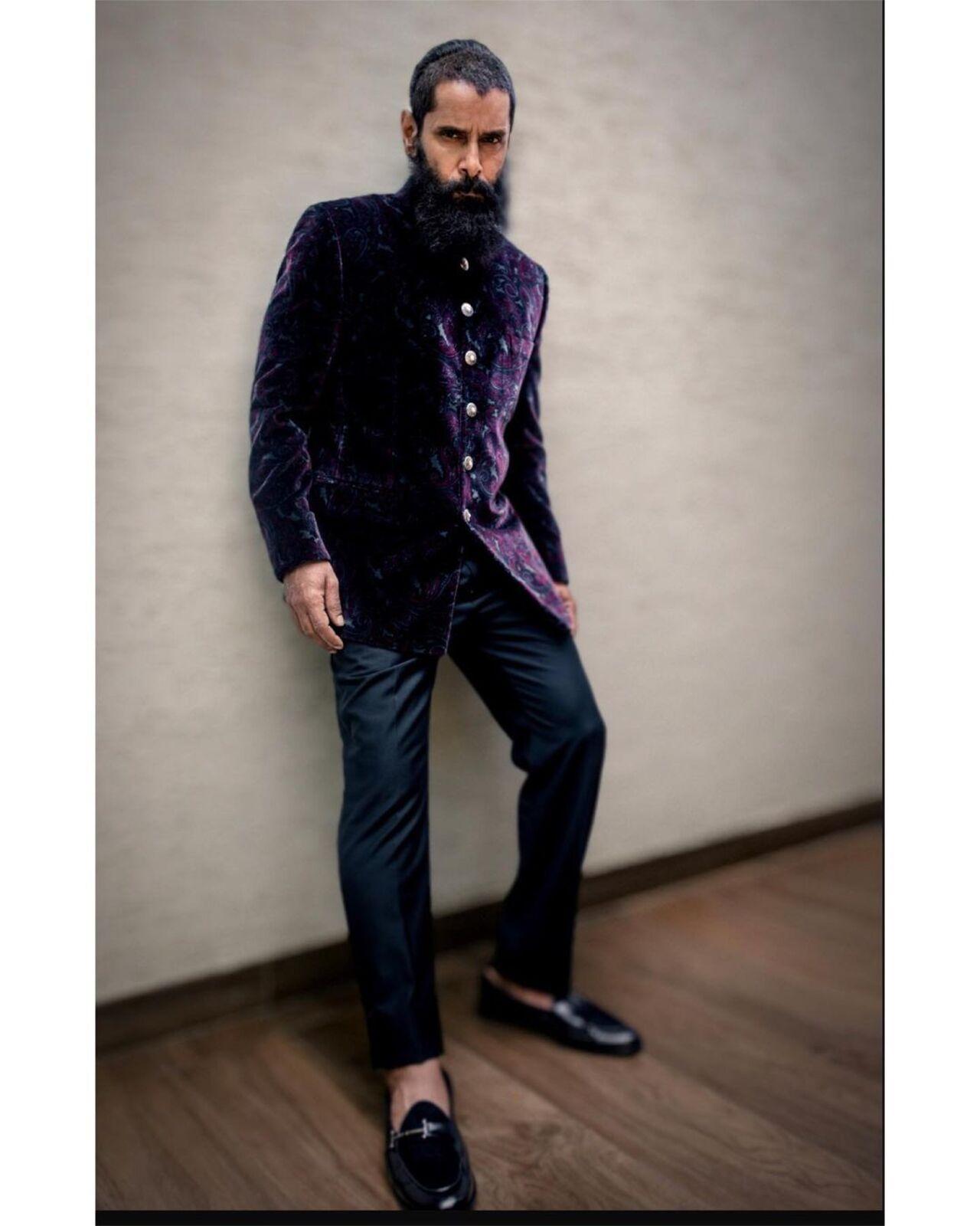 Vikram keeps it simple and classy in a pair of velvet bandh gala and formal black pants with formal leather shoes