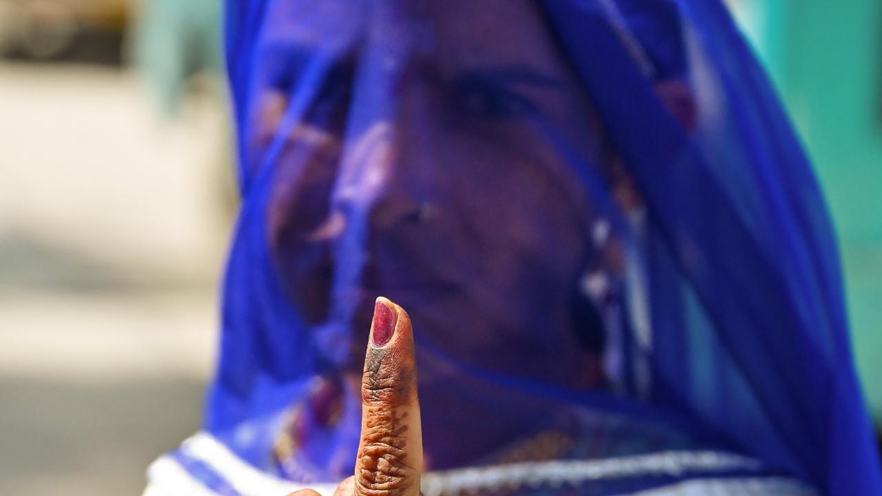 A veiled woman in Rajasthan after after casting her vote for the first phase of Lok Sabha elections 2024. Pic/PTI