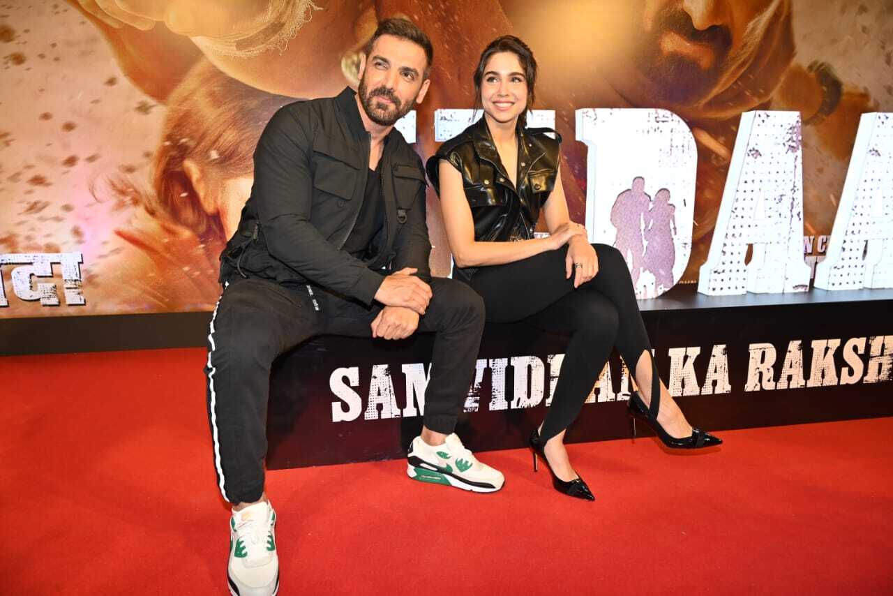 Sharvari and John strike a pose at the trailer launch event