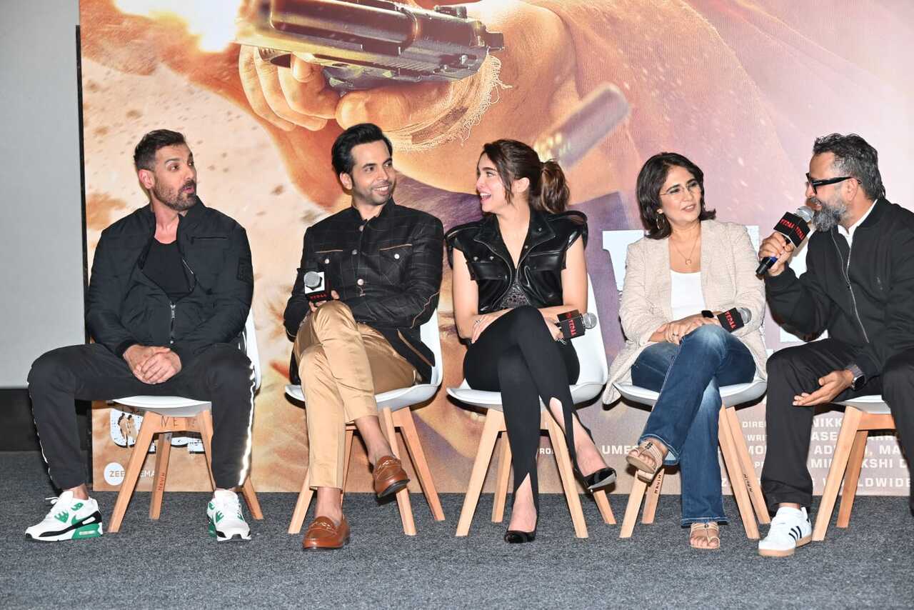 The team of Vedaa interacts with the media at the trailer launch event