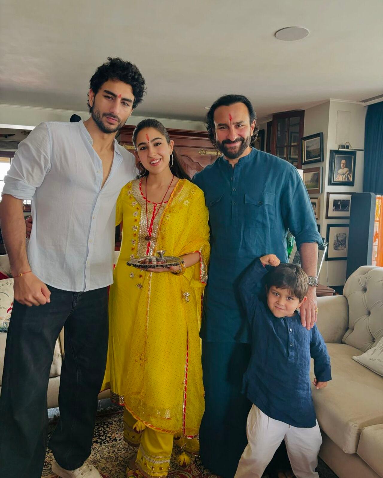 Saif Ali Khan poses with his kids Sara, Ibrahim and Jeh. The family looks stunning in traditionals. Taimur was missing from the celebrations as he had school to attend